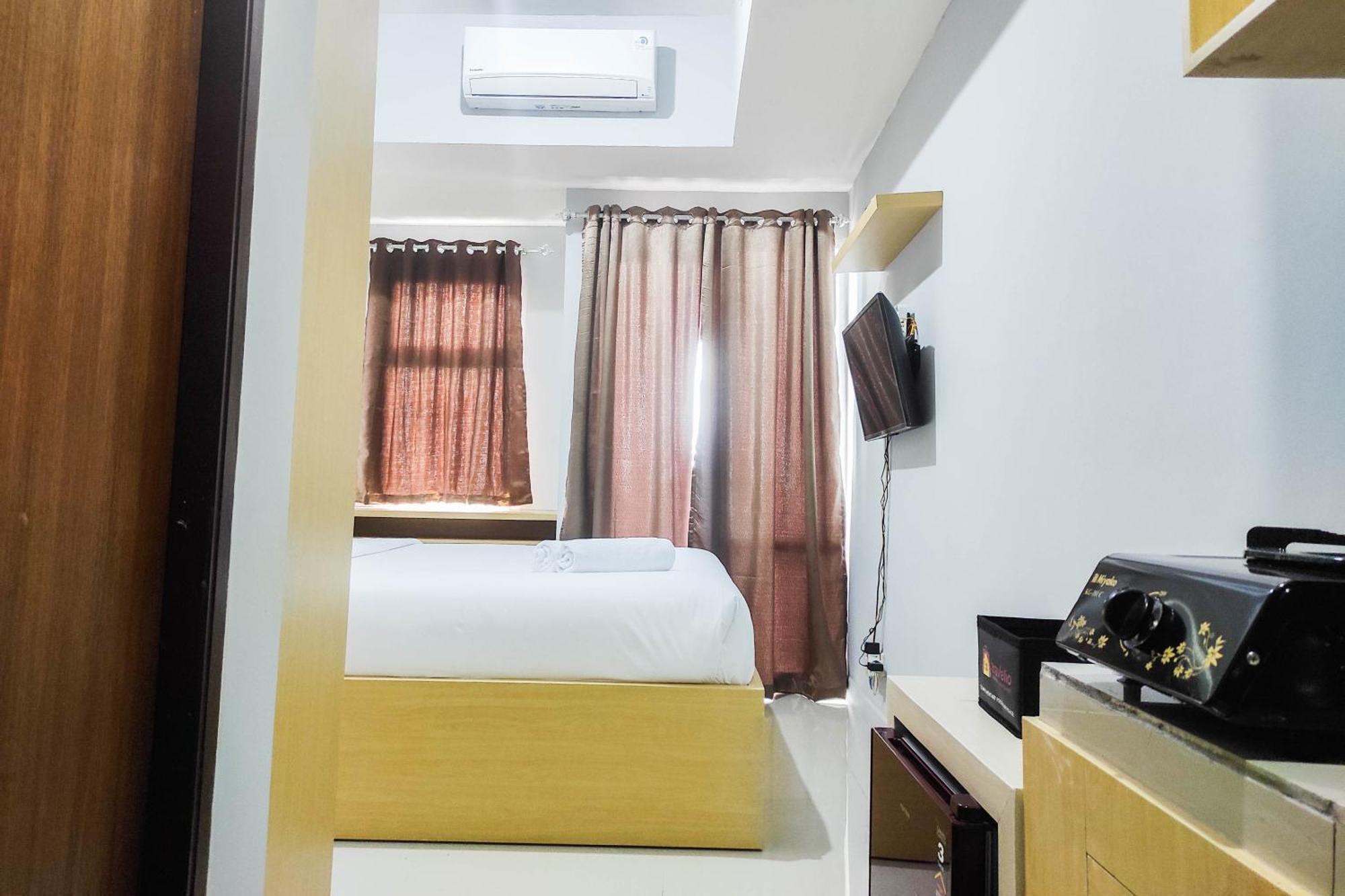Comfy And Minimalist Studio At Vida View Apartment By Travelio Pampang Exterior foto